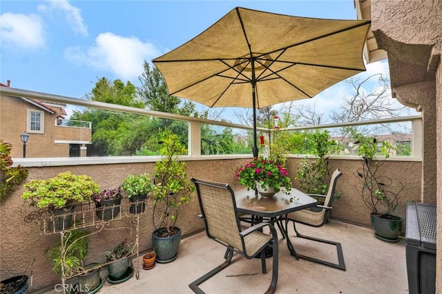 view of patio featuring outdoor dining space