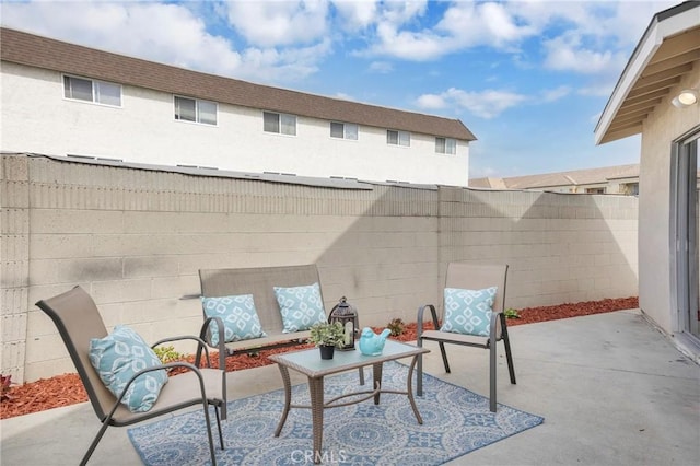 view of patio with fence