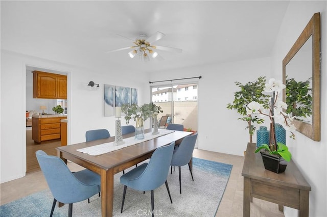 dining area with a ceiling fan