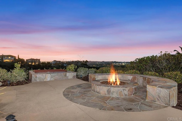 view of patio with an outdoor fire pit