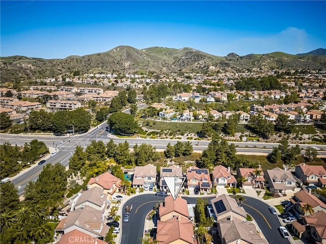bird's eye view featuring a residential view and a mountain view