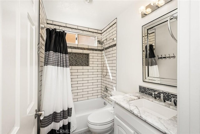 bathroom featuring vanity, toilet, shower / bath combo with shower curtain, and backsplash