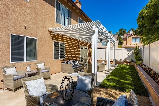 view of patio with an outdoor hangout area, a pergola, and a fenced backyard
