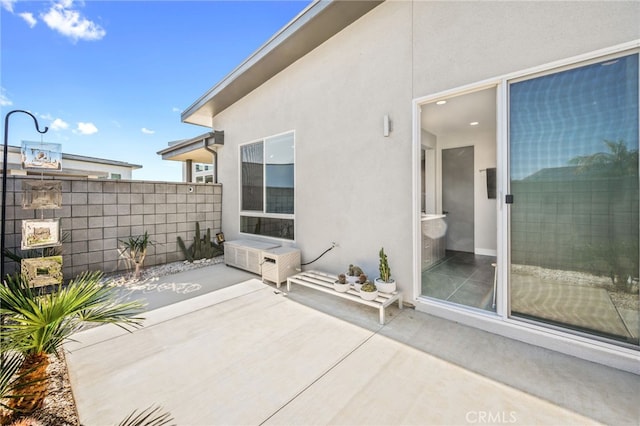 view of patio with fence