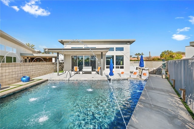 view of pool with a fenced backyard, a fenced in pool, and a patio area