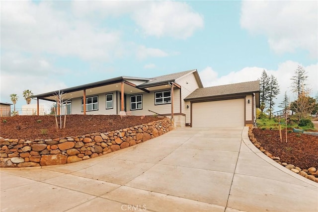 view of front facade featuring driveway and a garage