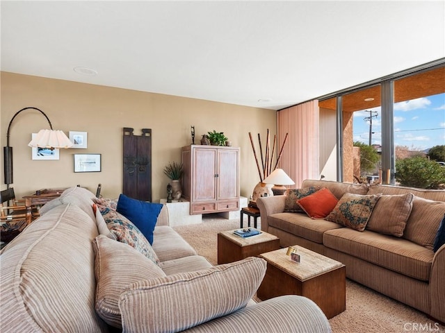 living room featuring light carpet