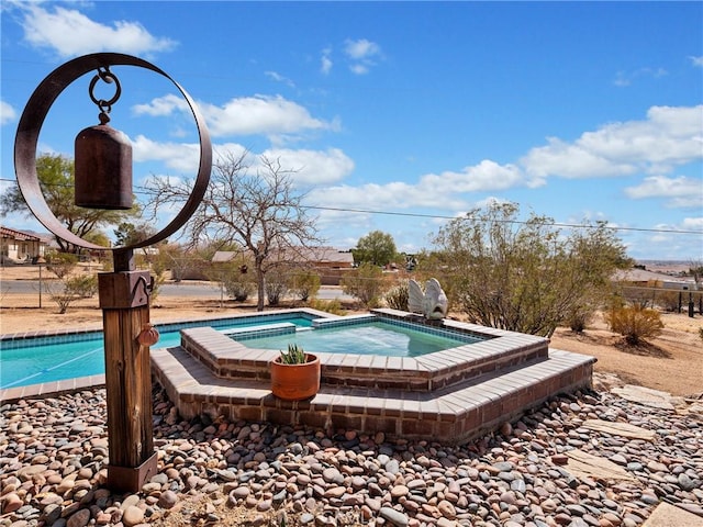 outdoor pool with an in ground hot tub