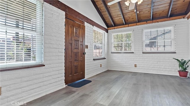 doorway to property featuring ceiling fan