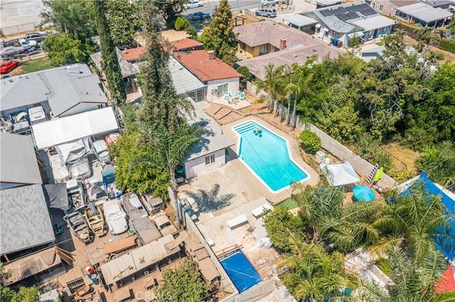 birds eye view of property with a residential view