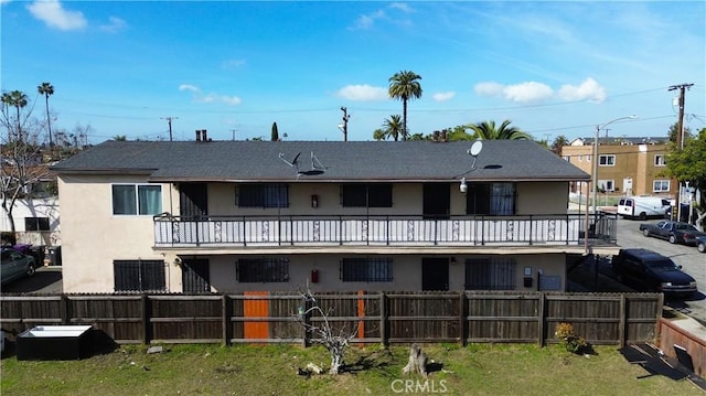 view of property with fence