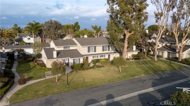 drone / aerial view with a residential view