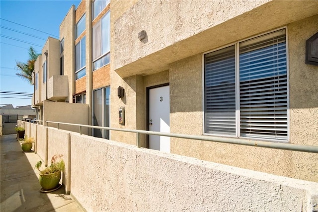 view of property exterior with stucco siding