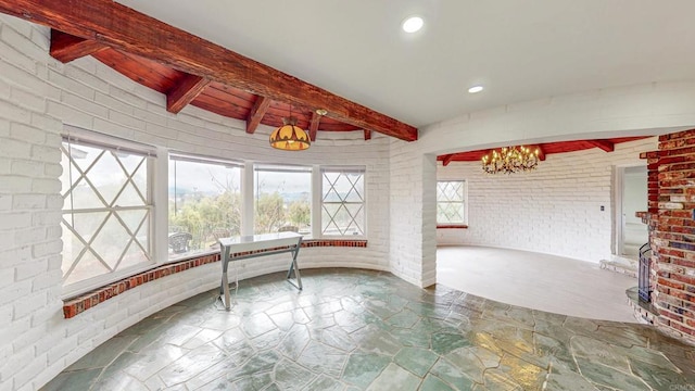 unfurnished sunroom with beamed ceiling and a notable chandelier