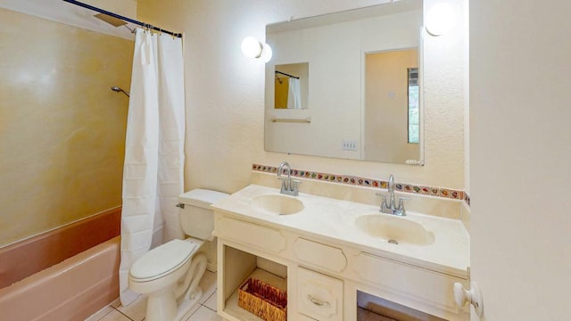 full bathroom featuring shower / tub combo, tile patterned flooring, a sink, and toilet