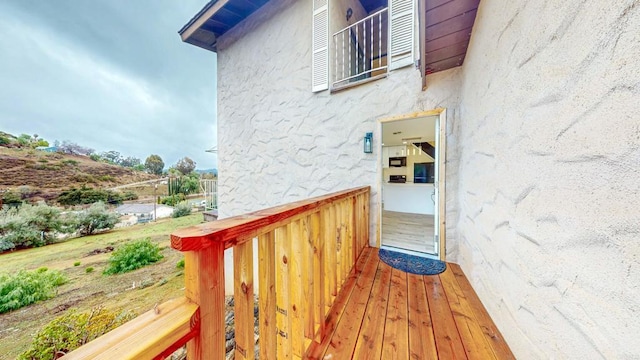 entrance to property featuring stucco siding