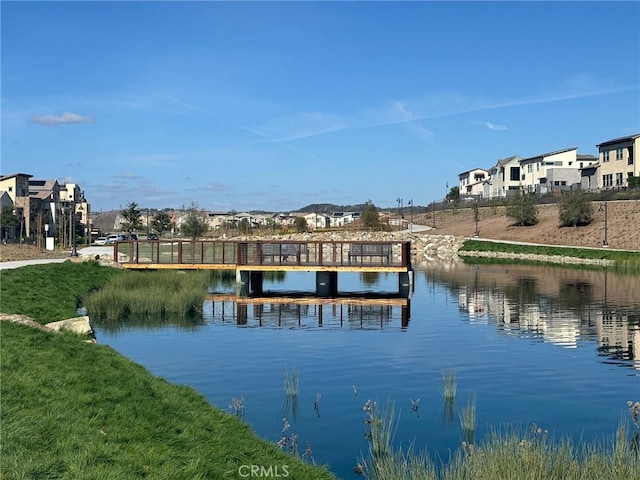 dock area featuring a water view