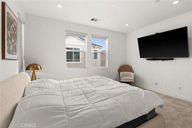 carpeted bedroom featuring visible vents, baseboards, and recessed lighting