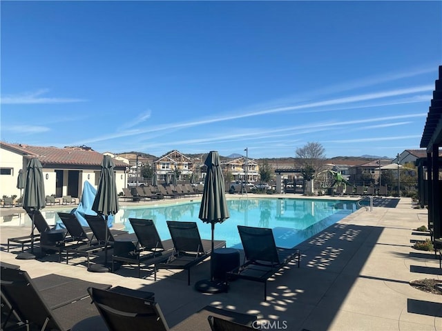 community pool featuring a patio