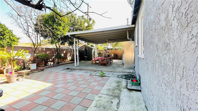 view of parking / parking lot with a fenced backyard