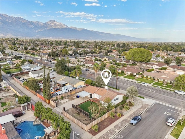 birds eye view of property featuring a residential view and a mountain view