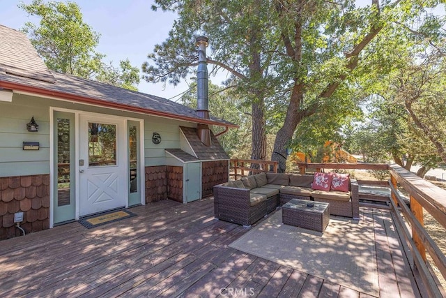 wooden terrace featuring an outdoor hangout area