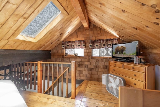 bonus room with wooden ceiling, vaulted ceiling with skylight, and wood-type flooring