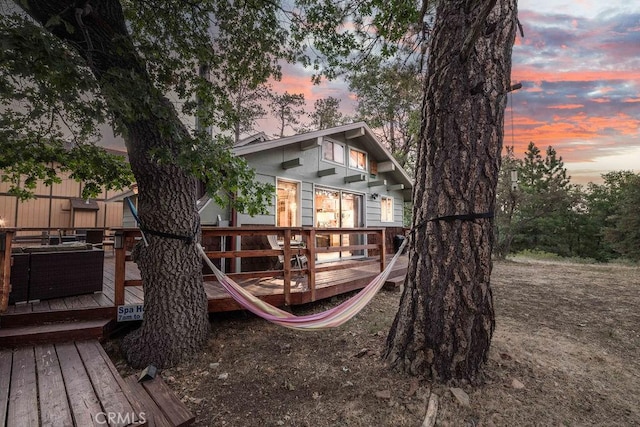 playground at dusk with a deck