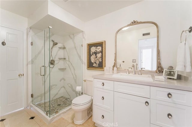 full bath featuring vanity, toilet, visible vents, and a marble finish shower