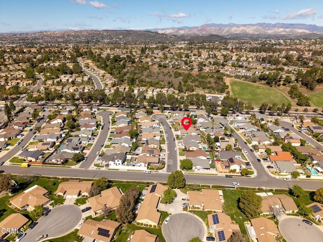 bird's eye view featuring a mountain view and a residential view