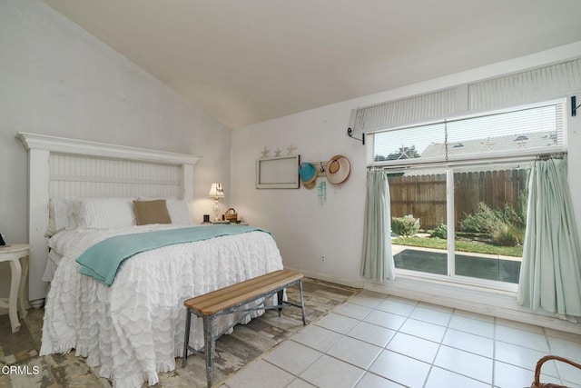 tiled bedroom with vaulted ceiling