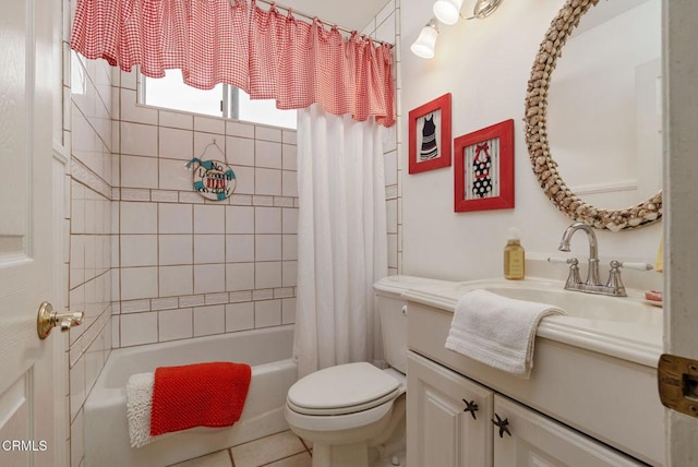 full bathroom with shower / tub combo, vanity, toilet, and tile patterned floors