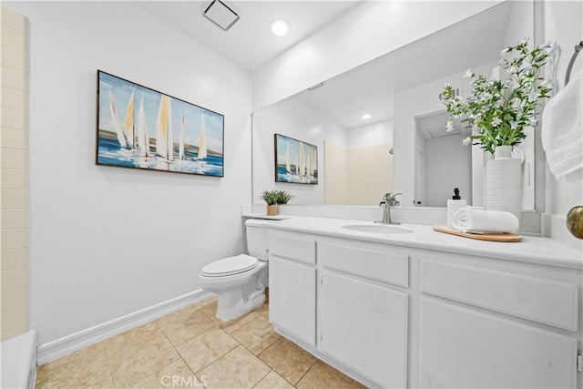 bathroom with baseboards, toilet, tile patterned flooring, vanity, and recessed lighting