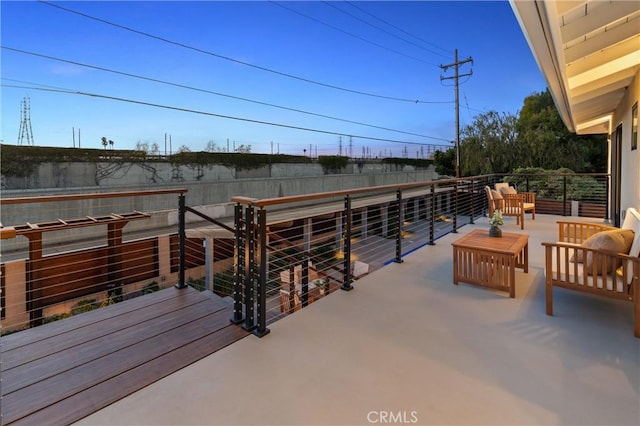 wooden deck featuring outdoor lounge area