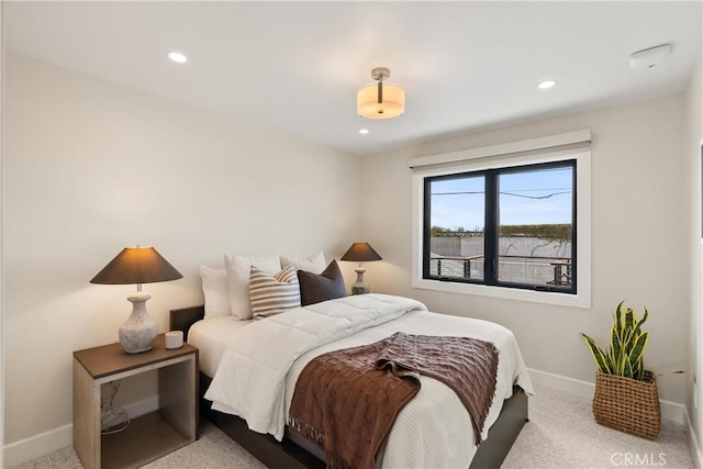 bedroom with carpet floors, baseboards, and recessed lighting