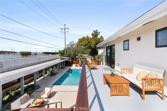 view of pool featuring a fenced backyard, outdoor lounge area, a fenced in pool, and a patio