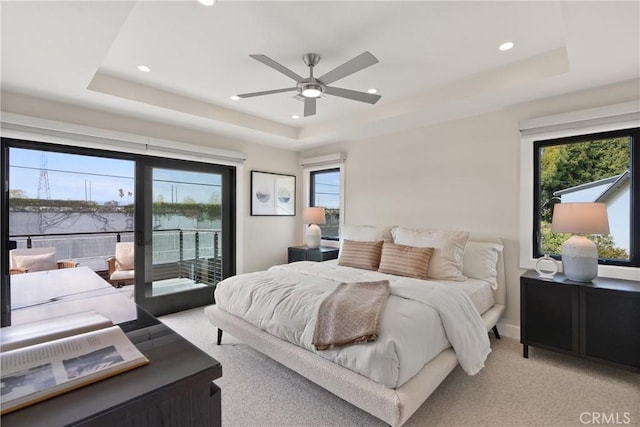 2885 Europa Dr, Costa Mesa, CA 92626 - bedroom featuring light carpet, recessed lighting, a tray ceiling, and access to outside