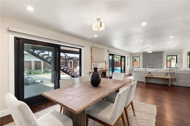 dining area featuring baseboards, dark wood-type flooring, and recessed lighting