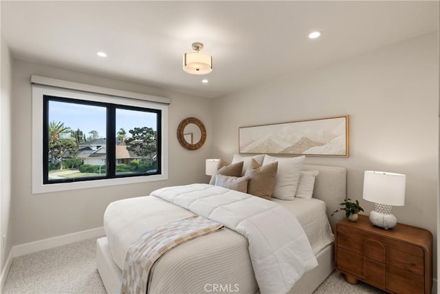 bedroom featuring carpet, baseboards, and recessed lighting