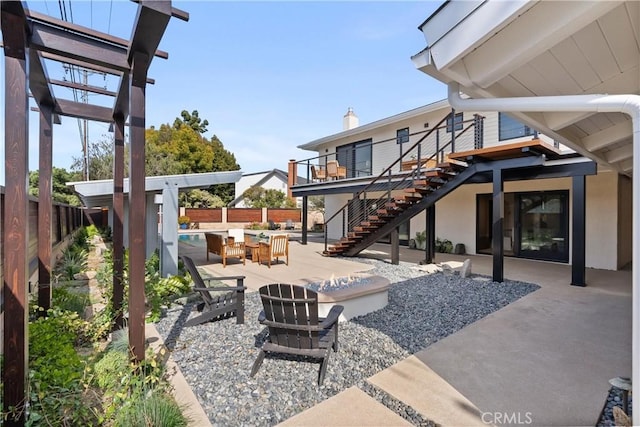 2885 Europa Dr, Costa Mesa, CA 92626 - view of patio featuring a fenced in pool, stairs, and a fenced backyard