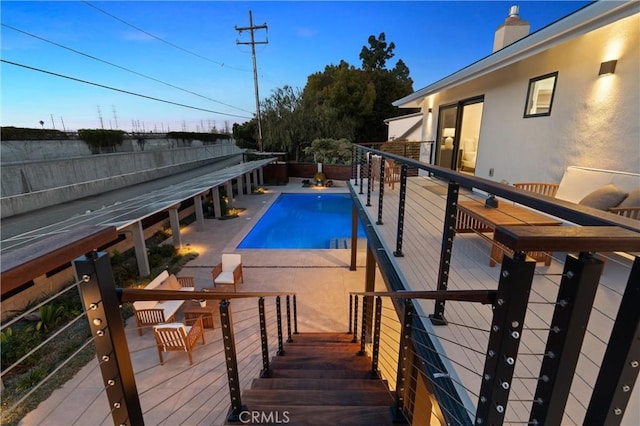 view of swimming pool featuring a fenced in pool