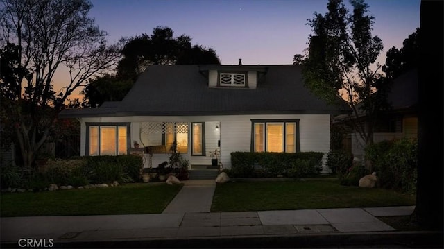 view of front of house with a lawn