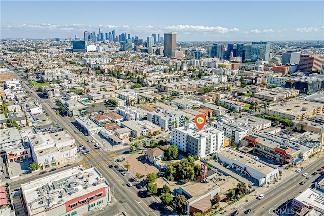 birds eye view of property featuring a city view