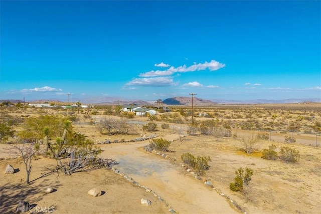 property view of mountains with a desert view and a rural view