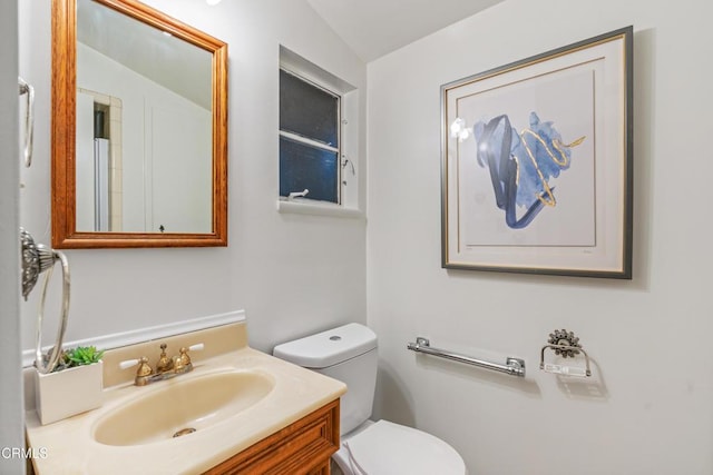 full bathroom with vanity and toilet