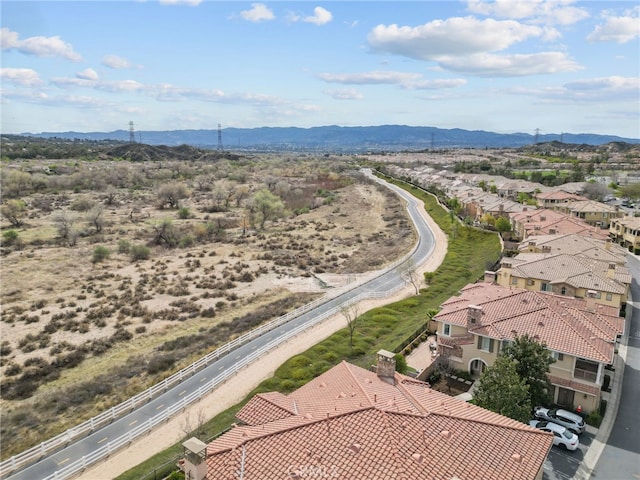 birds eye view of property with a residential view and a mountain view