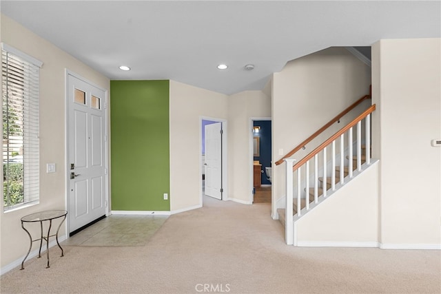 entryway with carpet, stairway, baseboards, and recessed lighting