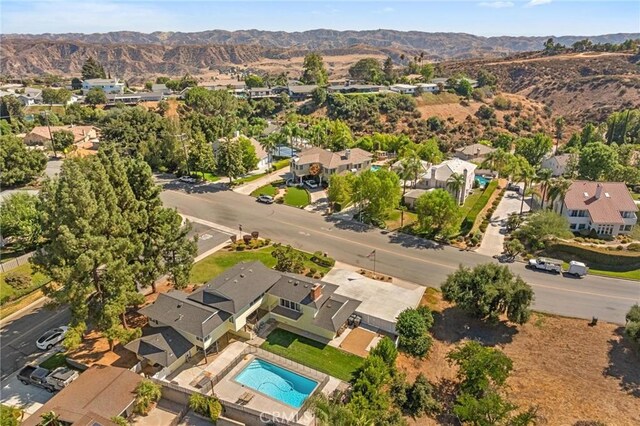 aerial view featuring a residential view and a mountain view