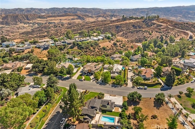 bird's eye view featuring a residential view and a mountain view