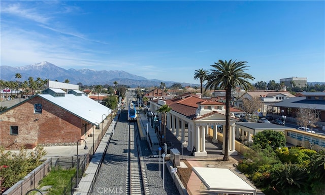 aerial view with a mountain view and a residential view